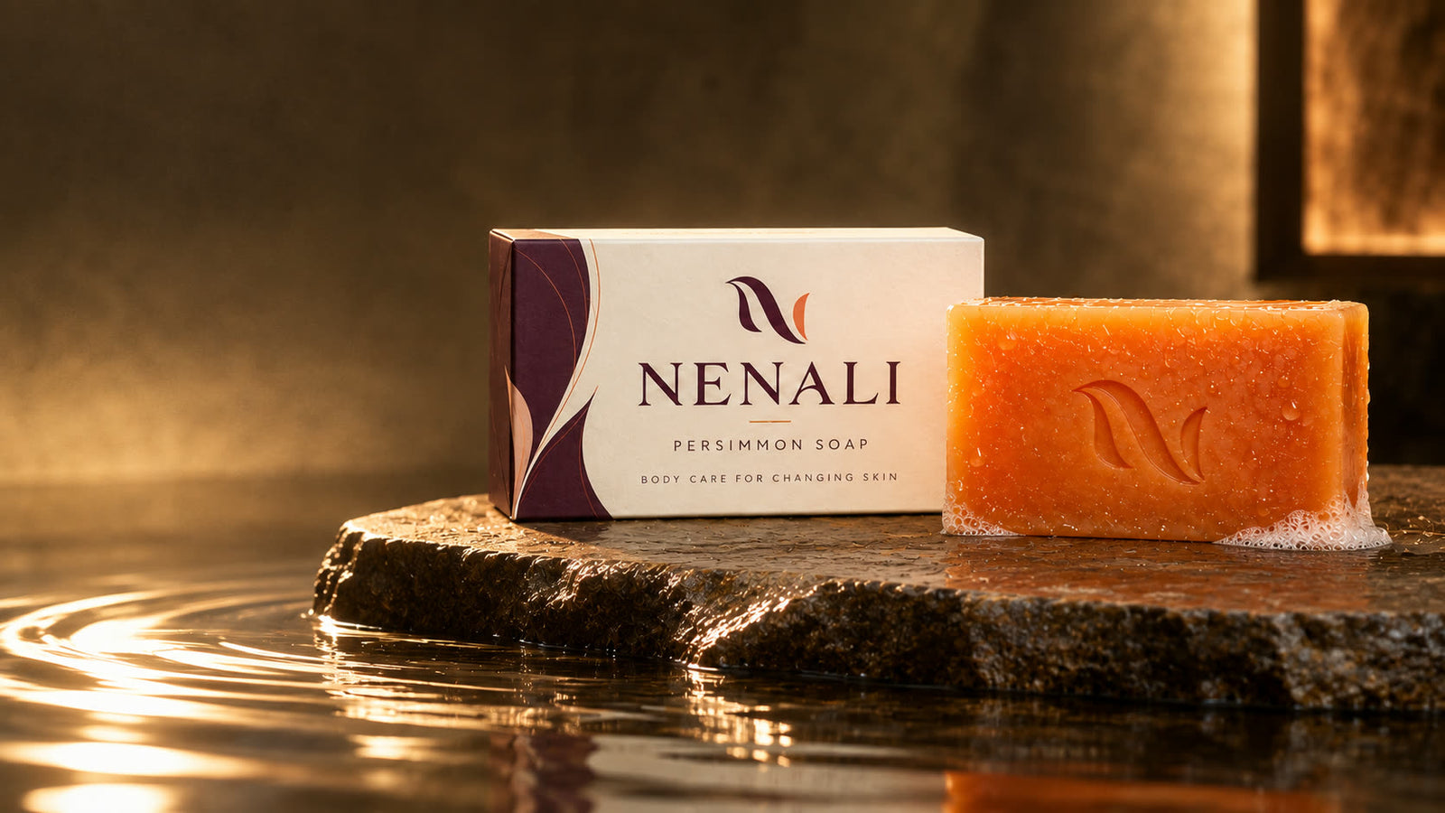 The NENALI Reset Bar and carton on wet stone
